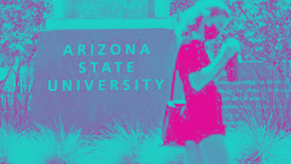 A woman standing in front of the Arizona Statue University statue