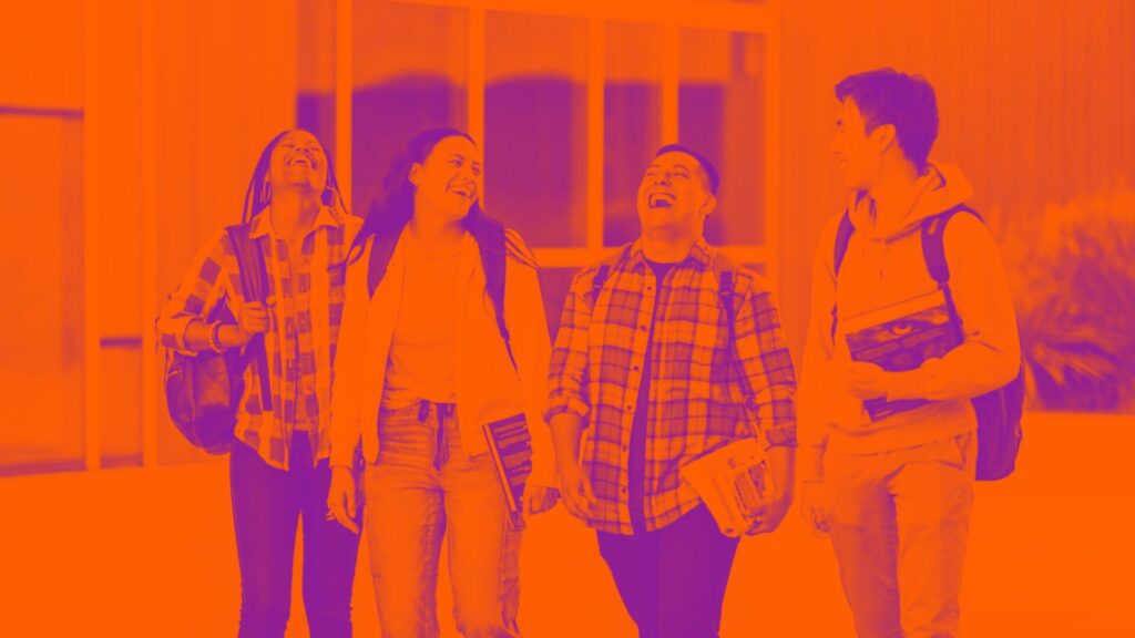 Group of Students Walking and Laughing Together