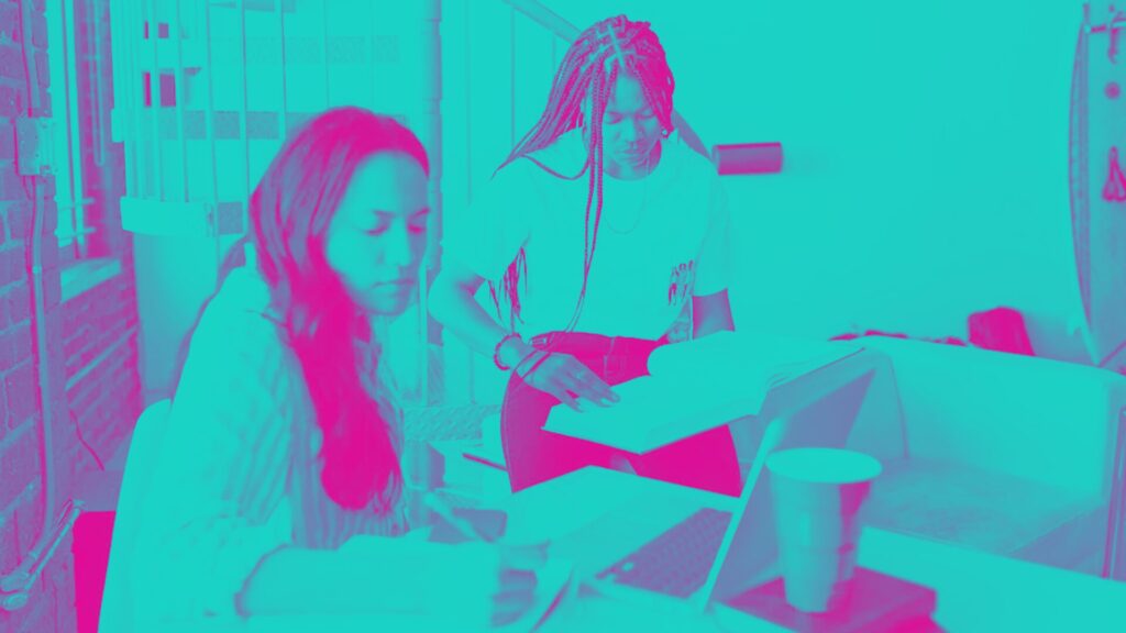 Women Doing School Work Together