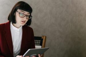 Student practicing blind review technique while studying LSAT questions, analyzing reasoning behind answers without checking correct responses.