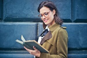 Student reading LSAT Prep Book.