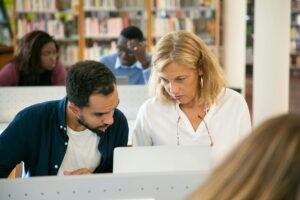 LSAT tutor helping student improve test strategies during a focused study session