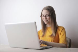 LSAT student confidently preparing on her laptop