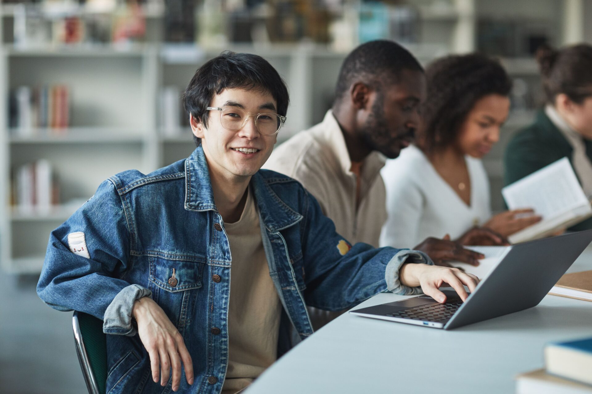 Student staring at his laptop.